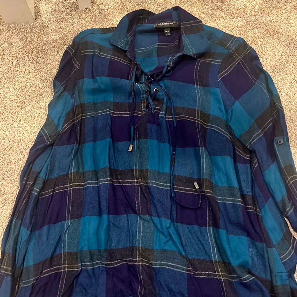 Gently used plaid Lane Bryant top with cross cross  drawstring front detail
